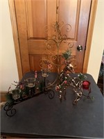 Christmas decorations:  metal tree, candle holder,