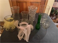 Glass vases and 1 ornate plastic vase