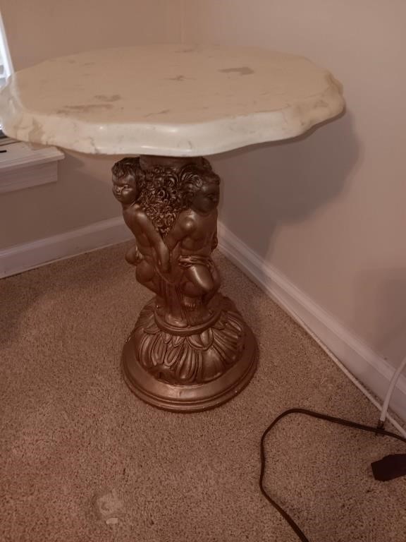 Mid-century cherub of small marble top table