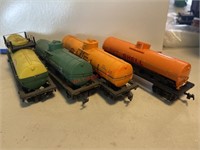 Set of 4 Model Train Tankers (hallway)