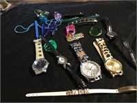 Lot OF Woman's Fashion Watches Plastic Rings Etc