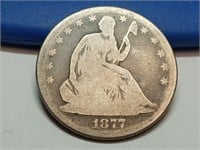 OF) 1877 s seated liberty silver half dollar
