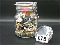 Glass jar full of vintage buttons