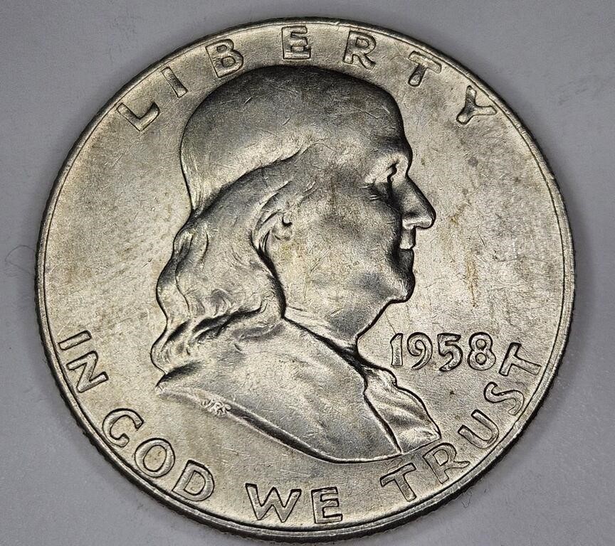 1958 d AU Grade Franklin Half Dollar