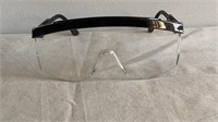Safety glasses, plastic, ear pieces adjust length