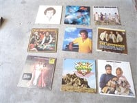 (E3) 9 L P record albums.  I did not play them,