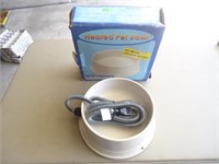 (E3) New. Heated pet bowl.  The box shows some