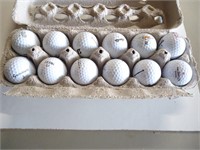 (E3) 12 used golf balls.  Cleaned and in good