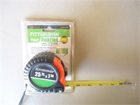(E3)  NEW 25 foot tape measure.