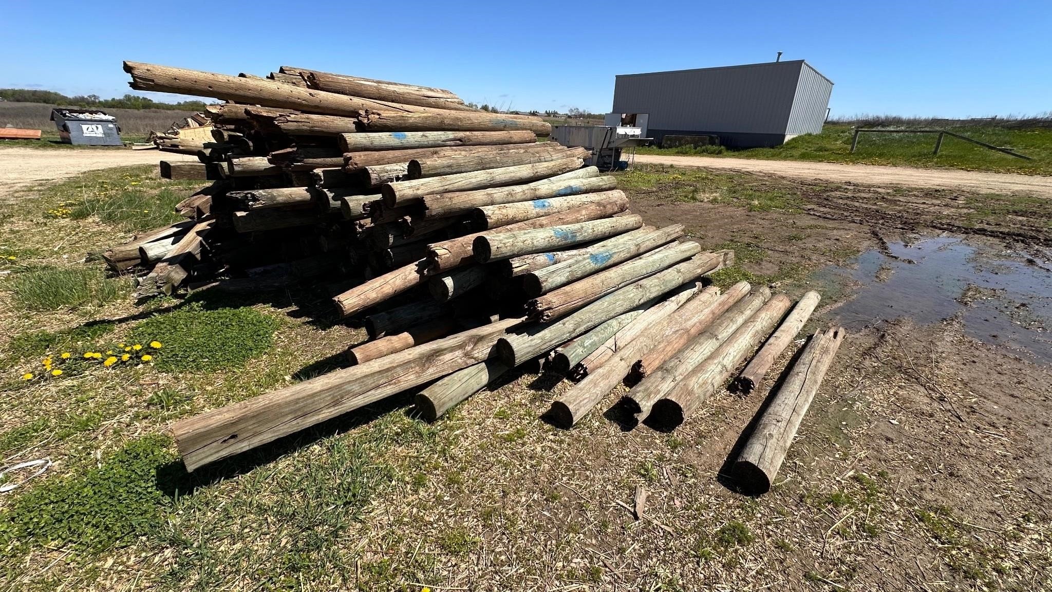 Pile of treated fence post