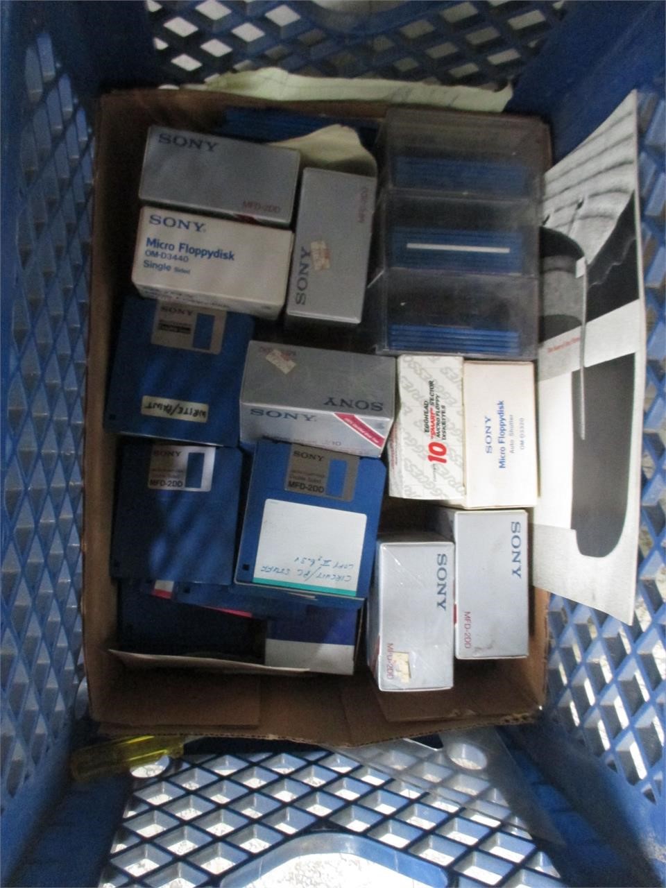 Lot of floppy disks in w/ crate
