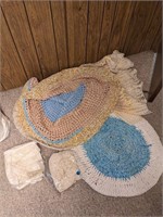 Assortment of woven circle rugs (Bedroom 1)