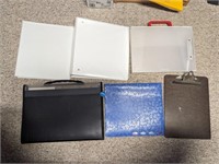 Assortment of binders and clipboard (Office)