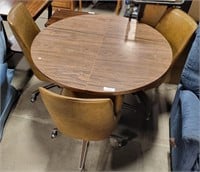 MID-CENTURY ROUND TABLE W/ ROLLING CHAIRS