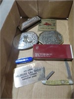 COLLECTION OF KNIVES, BELT BUCKLES, HARMONICA MISC