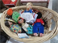 COLL OF ORIENTAL DOLLS IN A BASKET