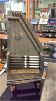 Vintage autoharp with nice wooden old Easel