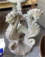 Cast concrete sea horse tripod pedestal base