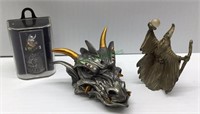 Combined lot includes a pewter dragon head