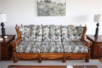 Wood frame cottage style three seat sofa with