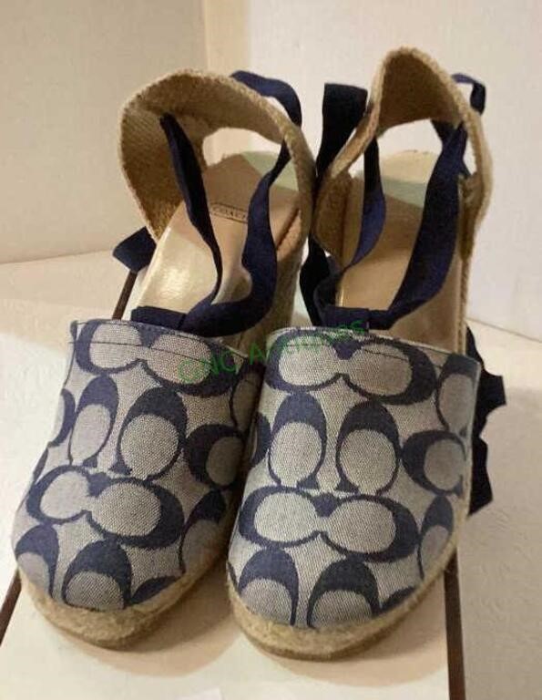 Marked Coach brand ladies shoes size 5M.