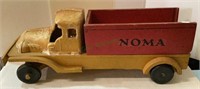 Vintage Noma wood dump truck pull toy measures