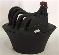 Cast iron hen on basket measuring 7 1/2 inches