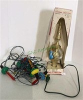 Vintage Christmas items include a tree topper