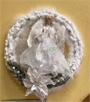 Beautiful white wreath using chunky yarn with an