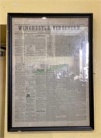 Framed newspaper page from the Winchester