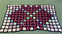 Large Afghan w/square block design mostly pink in