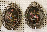 Two floral prints in heavy metal frames each