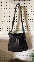Marked Coach purse with dust bag. Purse