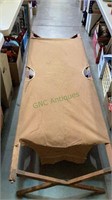 Vintage canvas and wood foldable army cot - has a