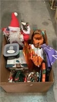 Box of holiday cheer includes a large Santa