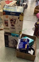 Lot includes an Oster blender in original box
