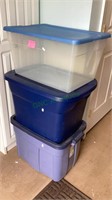 Three large plastic tubs with lids.  1