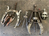 Assortment of five gear pullers.