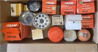 Assortment of mostly Fram oil and fuel filters.