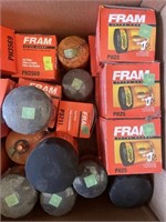 Large assortment of mostly Fram oil filters.