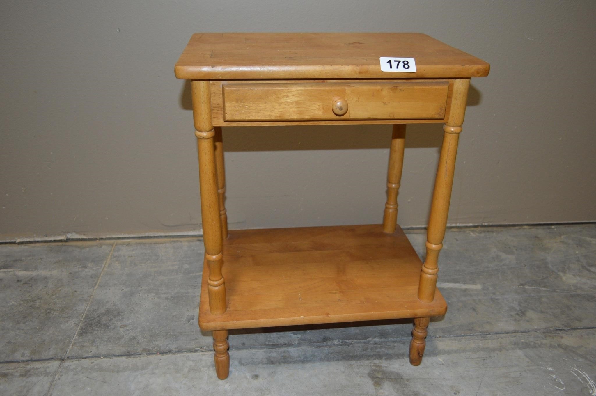 Small table with single drawer and shelf