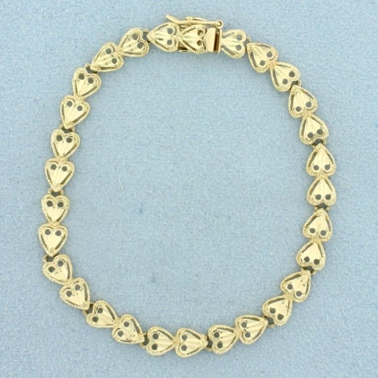 6 1/2 Inch Heart Link Diamond Cut Bracelet in 14K