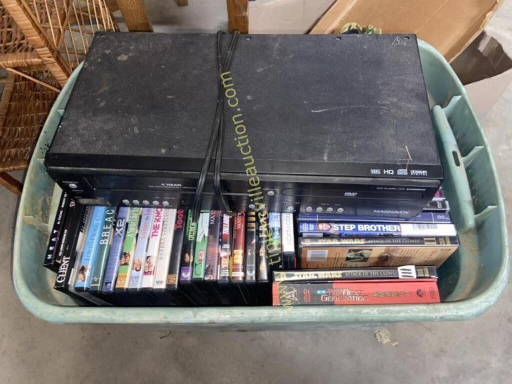 Box of dvds and dvd/vcr player