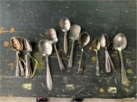 lot of small silver spoons