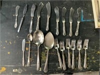 sterling silverware with holed forks