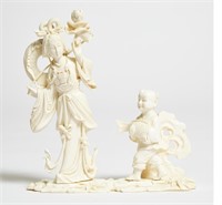 An ivory Carving of Xiangu and boy holding a carp2