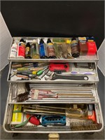 Tool box of gun cleaning supplies