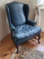 Blue-green leather wing back chair.  Look at the