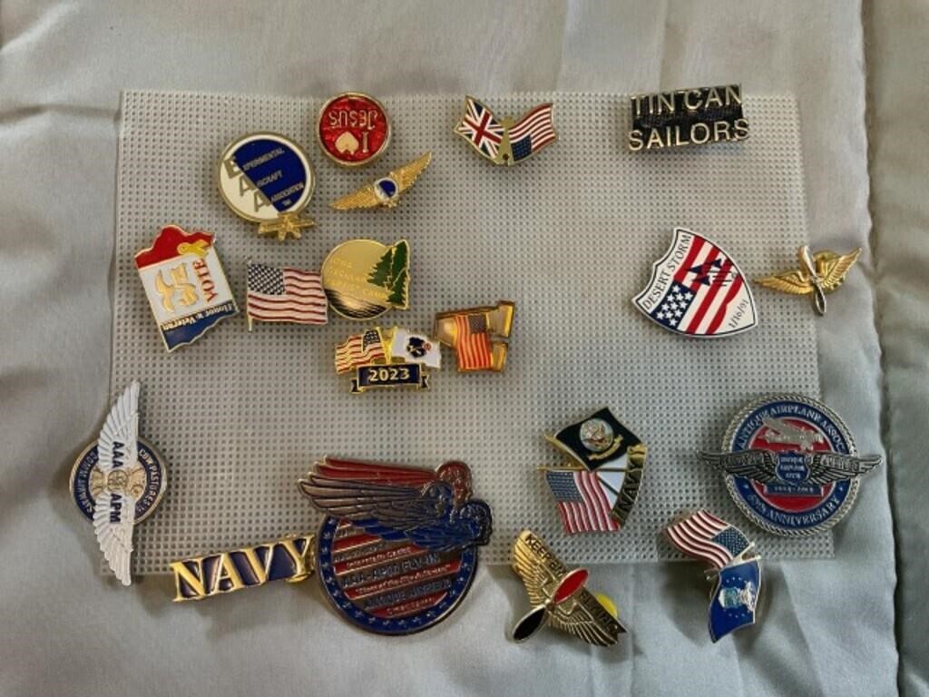 Pins.  Mostly patriot and service related