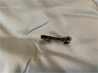 Crescent tie clip